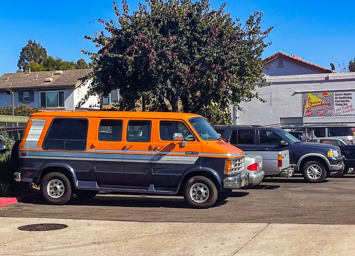 Customer vehicles parked on the lot at Galaxy Automotive in Tustin